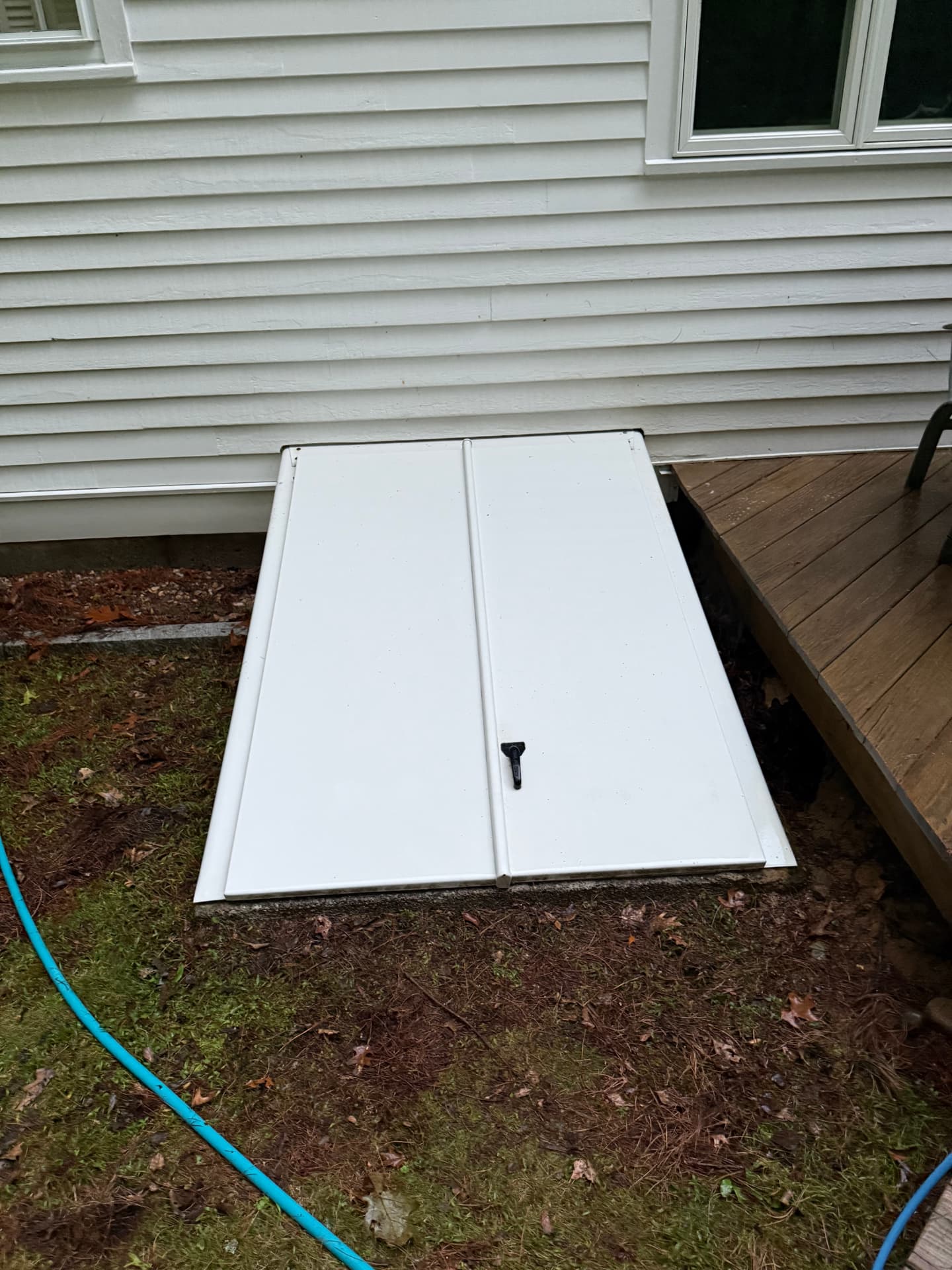 The same cellar door bright white and streak-free after pressure washing